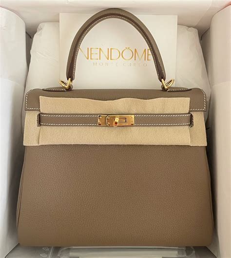 hermes kelly to go etoupe|hermes kelly backpack.